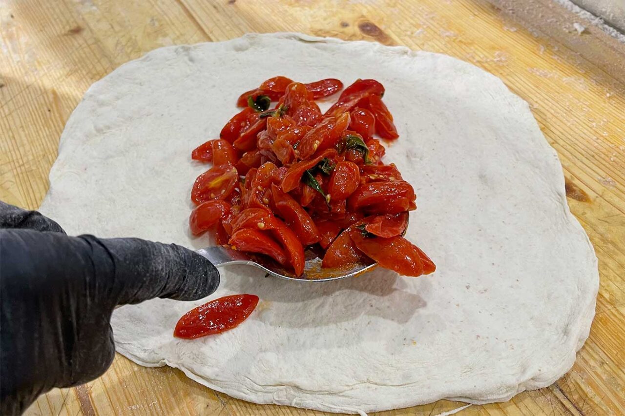 il giusto peso dei pomodori sulla pizza